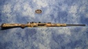 USED SAVAGE AXIS 243 WIN CAMO STOCK W/SCOPE