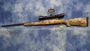 USED SAVAGE AXIS 243 WIN CAMO STOCK W/SCOPE