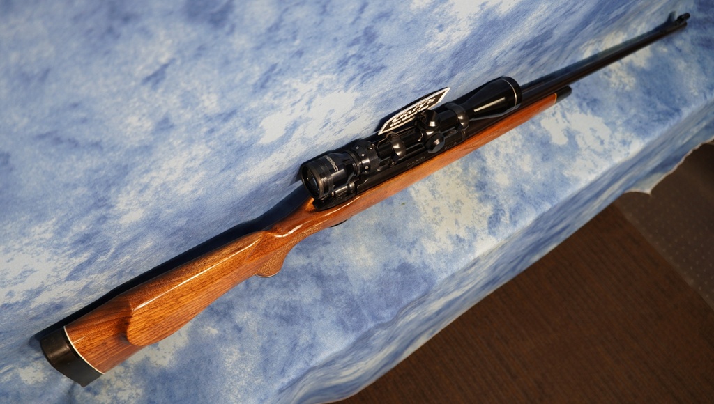USED REMINGTON MODEL 700 BDL LEFT HAND 7MM REM MAG WITH SCOPE