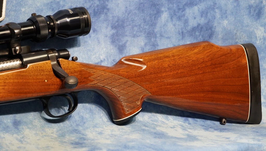 USED REMINGTON MODEL 700 BDL LEFT HAND 7MM REM MAG WITH SCOPE