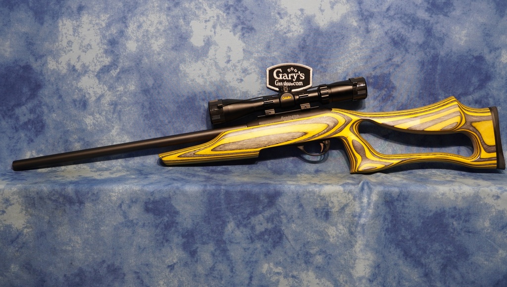 USED REMINGTON 597 22 LR 20" HVY BBL LAMINATE STOCK W/SCOPE