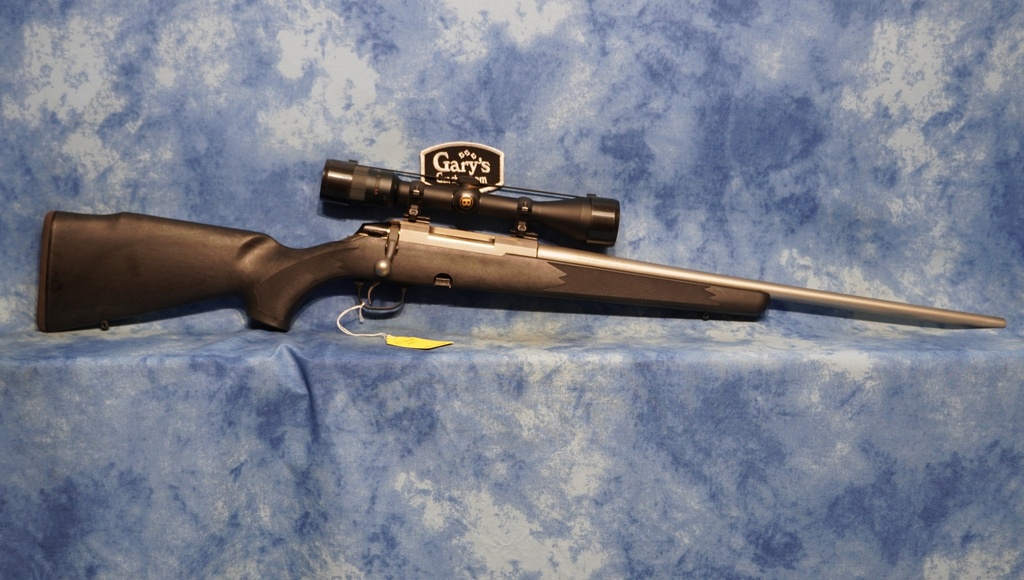 USED TIKKA MODEL 595 SYNTHETIC 243 WIN SS 22" BBL W/SCOPE